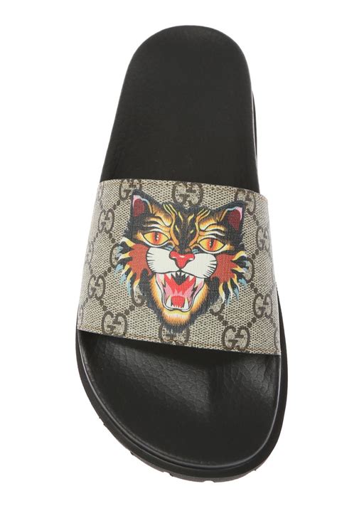 gucci men's tiger sneakers|gucci tiger head slides.